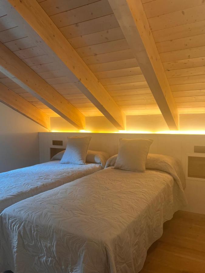 Apartamentos Turisticos: Tu Casa En Sahun Luaran gambar